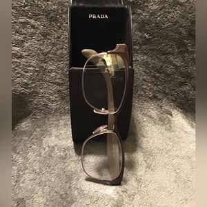Prada glasses.